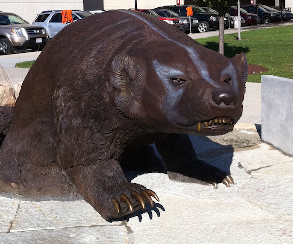 Bronze badger statue in front of entrance to Camp Randall Stadium.