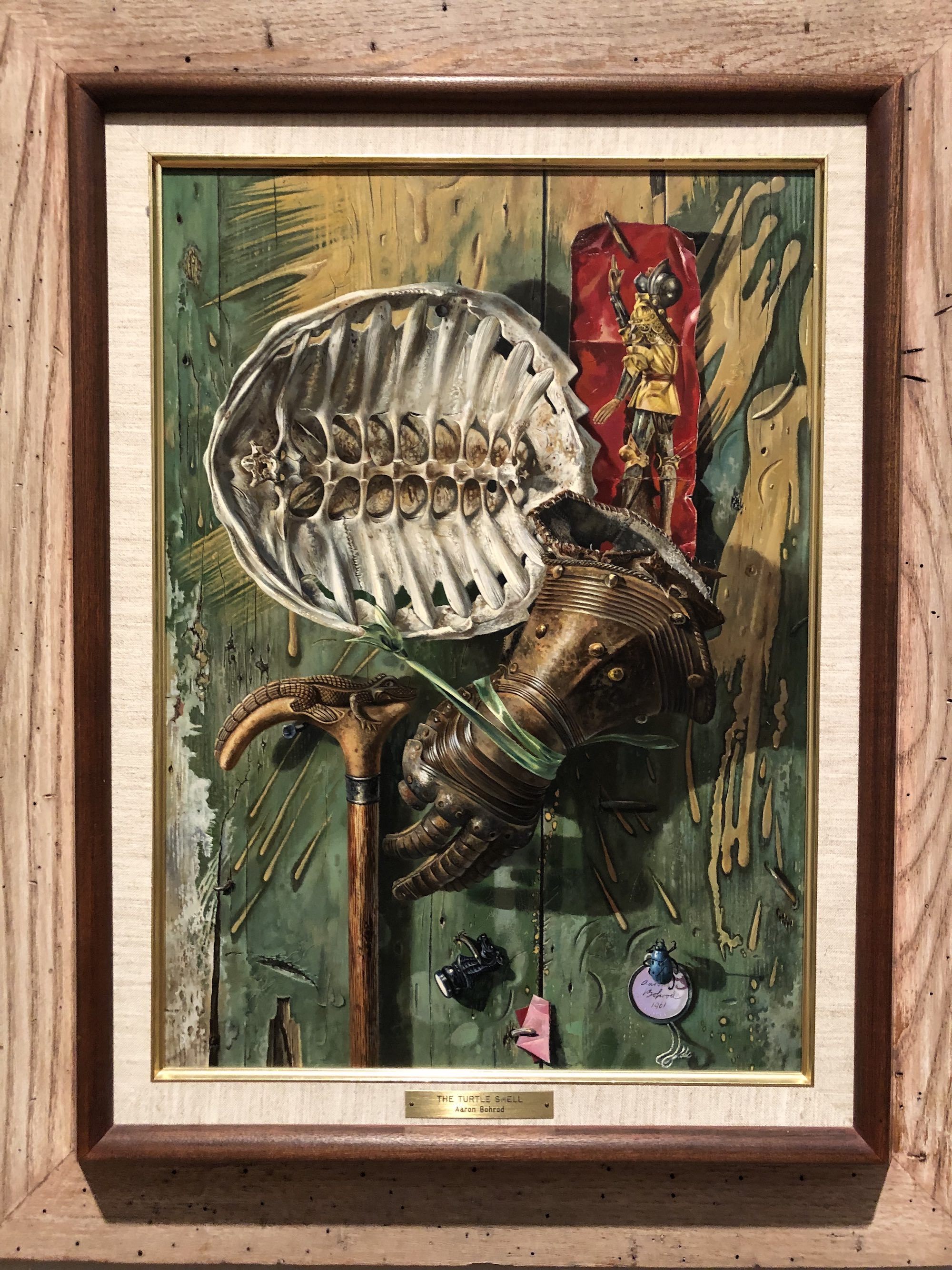 The Turtle Shell by Aaron Bohrod (1961). Oil on hardboard at the Chazen Museum of Art in Madison, Wisconsin.