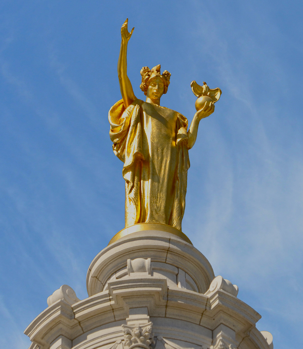 Wisconsin statue on top of Capitol dome.